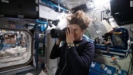 NASA astronaut Kayla Barron snaps an image of the sample location on the US Module Node 2 (Harmony) on the International Space Station for the Quadruple Angle Gathering Research Experiment on Jan. 15.