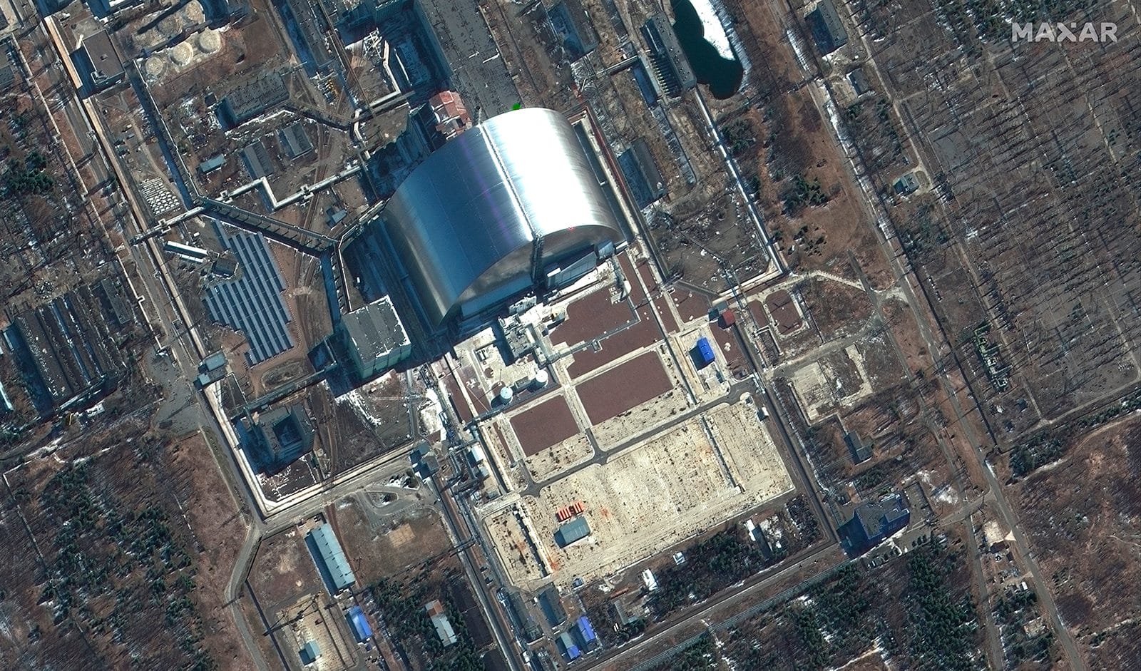 This satellite image provided by Maxar Technologies shows a close-up view of the Chernobyl nuclear facilities, Ukraine, on Thursday, March 10.