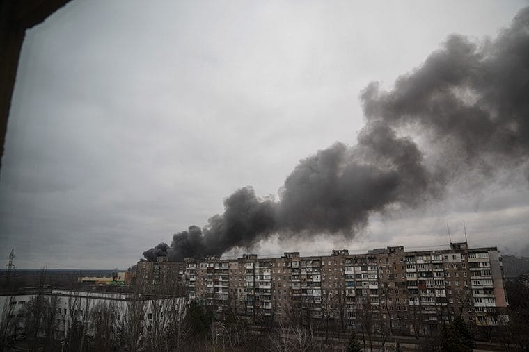 Smoke rises after an apparent shelling by Russian forces in Mariupol, Ukraine, Friday, March 4.